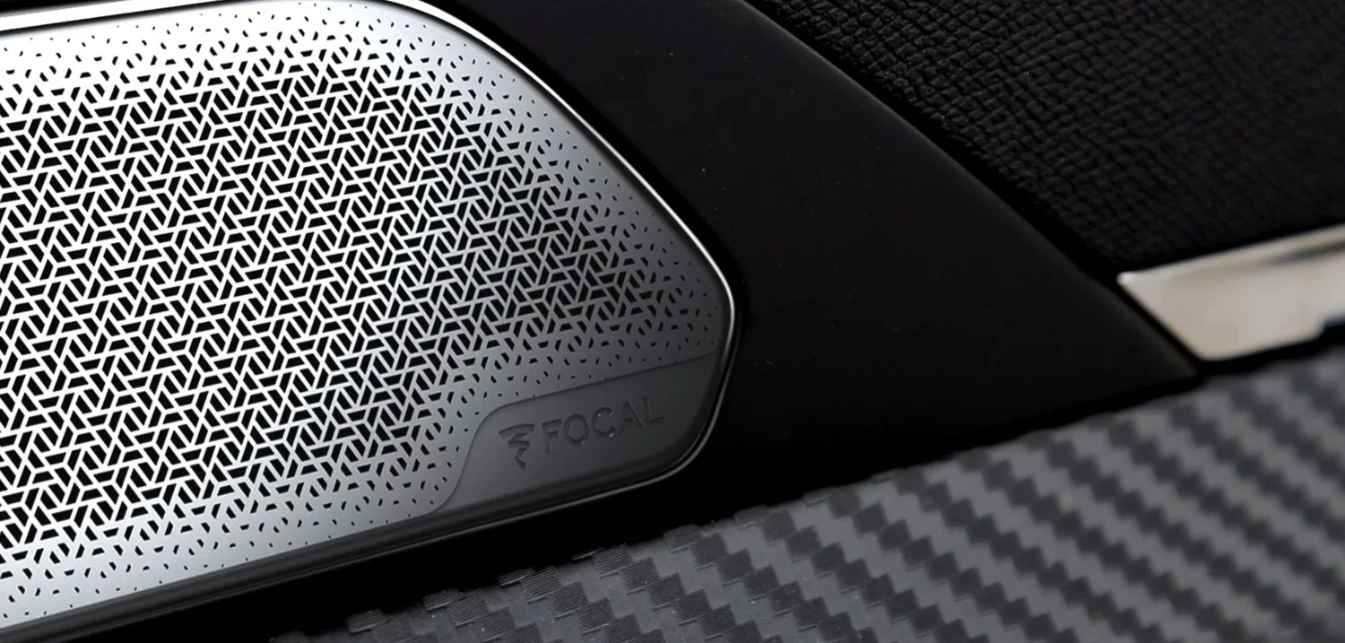 Interlocking speaker perforation
